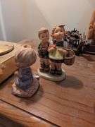 2 Hummel figurines: Kneels in prayer, To market