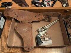 Leslie-Henry revolving cylindar cap pistol w/ Wyatte Earp holster