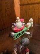 Celluloid windup w/ rabbit, 3 chicks, egg and basket w/ bell