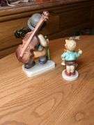 2 Hummel figurines: Boy w/ horse {chipped), Little cellist