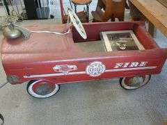 Viktor Schreckengost Metal firechief pedal car, with a book about the designer, and print