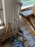1 Wooden easel, 1 metal easel