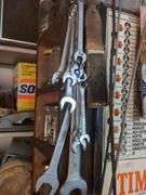 Shelf and contents: 10+ crescent wrenches, nuts and bolts