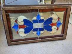 White metal cart, wooden cutting board, and metal table, 3 wall art/stained glass