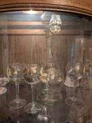 Glass floral decanter w/ 3 matching glasses