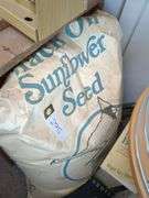 Hummingbird feeder, boxes of thistle seed, bag of sunlfower seed, bird guide