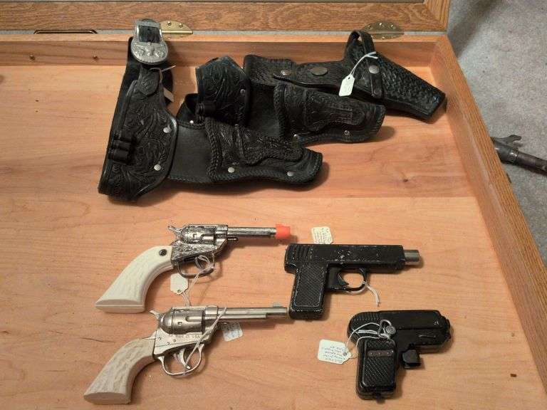 4 Vintage toy cap pistols w/holsters image
