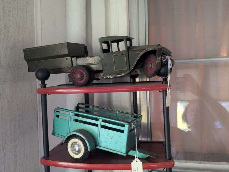 Pressed steel dump truck and Ny-Lint toys 2 wheeled trailer image