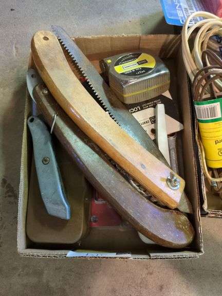 Saw, Utility Knife, Tape Measure, Multimeters, Extension Cords, and Bungee Cords image