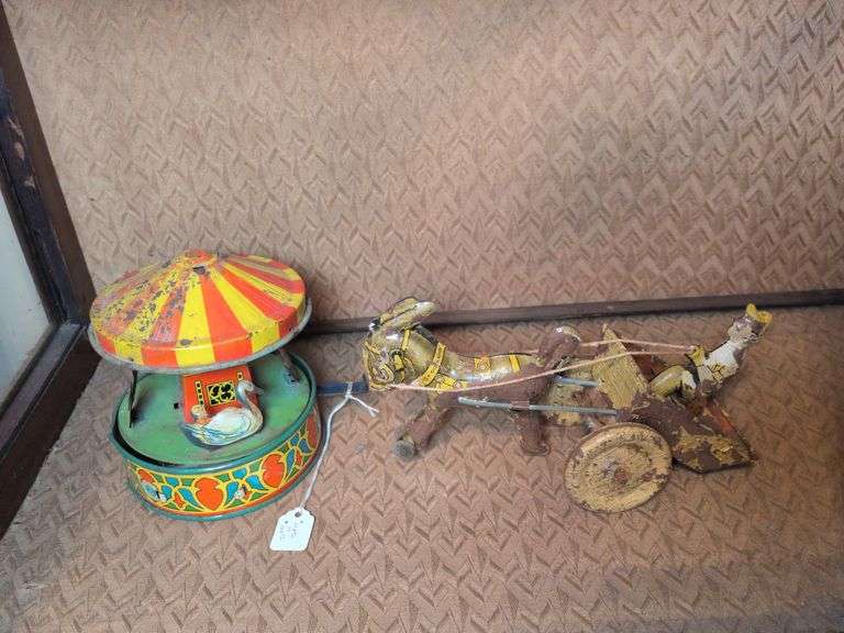 Wyandotte #2010 Merry Go Round and Tin Wind Up Toy Donkey and Wagon with Farmer image