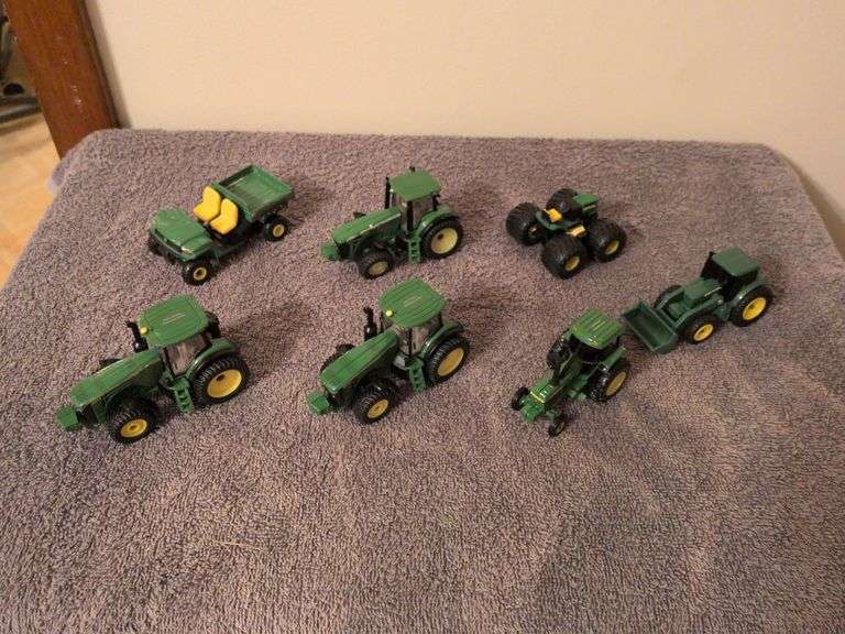 6 John Deere tractors and truck image