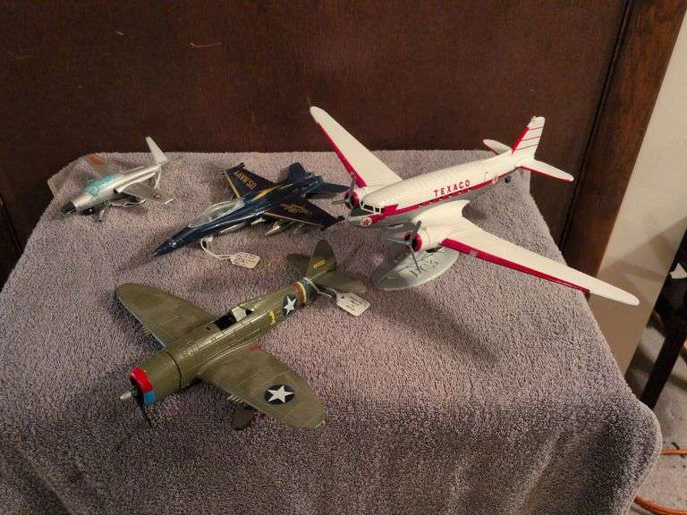 4 planes: Shuco microjet #1031, Blue Angels, Texaco Douglas DC-13 and P-47 Thunderbolt image