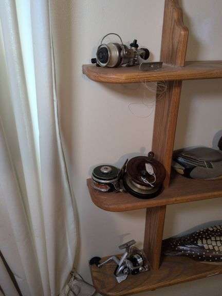 4 fishing reels: Daiwa RS 1355, vintage Milwards brownie brass and mahogany, vintage Shakespeare and Shakespeare Cirrus image
