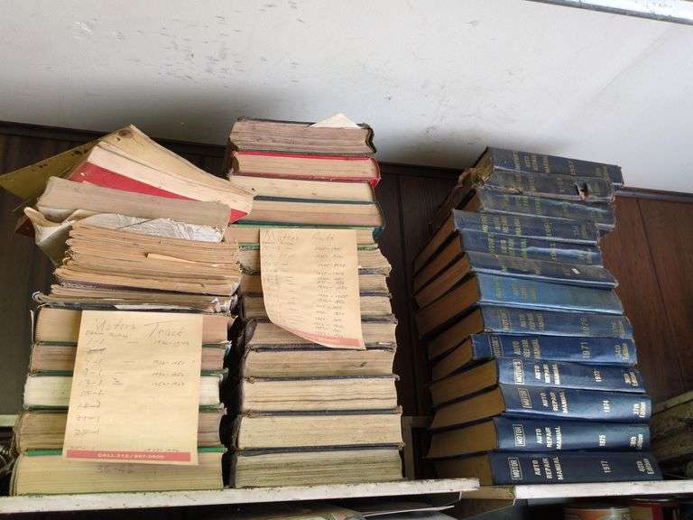 Shelf of Automotive Manuals image