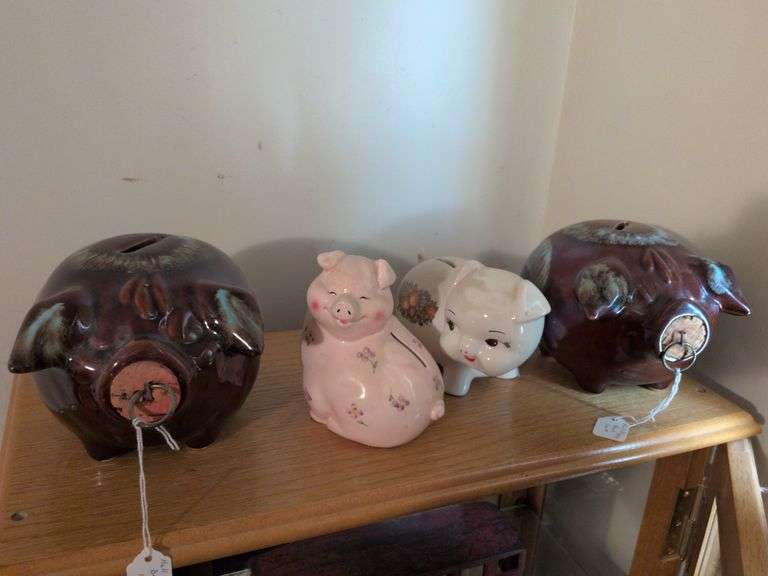 Two 5" Hull piggy banks, Norcrest piggy bank and unknown piggy bank image