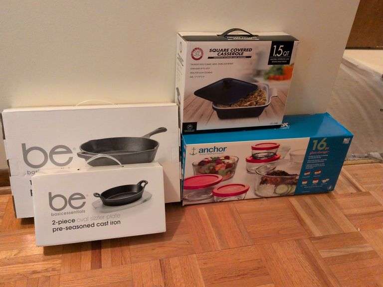 Be basicessentials 10" cast iron skillet, 2 piece oval fajita set, 2 piece oval sizzler plate, Chef's Counter square covered casserole dish and Anchor 16pc glass storage all new in box image