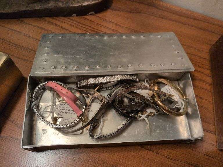 Vintage watches in metal box image