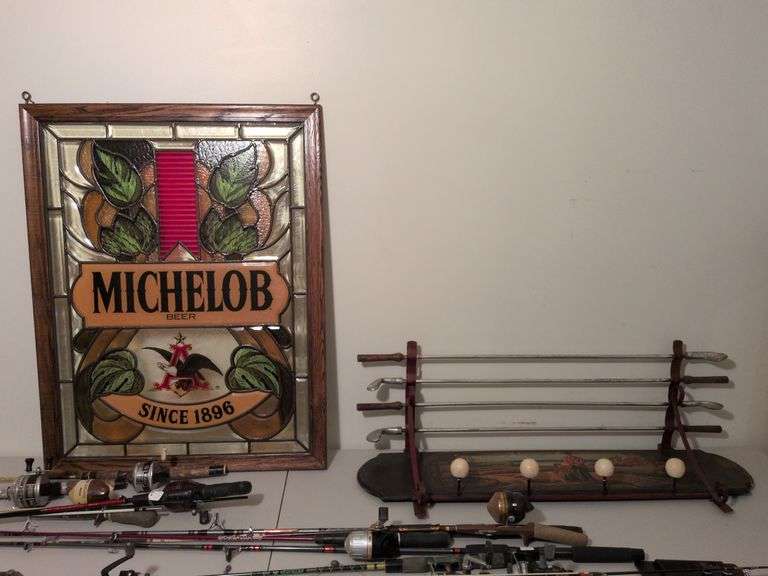 Golf club and ball wall rack and Michelob beer sign image