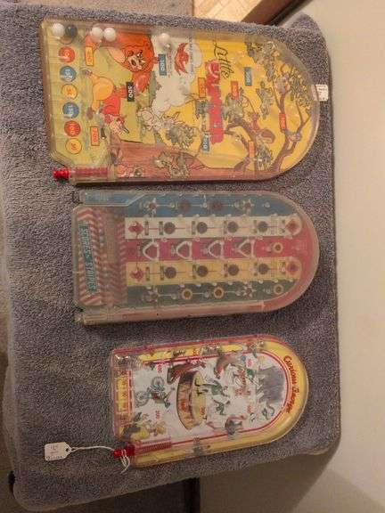 3 Vintage handheld pinball games: Schylling Curious George, Wolverine Little Hunter and Marx Scores N Stripes image