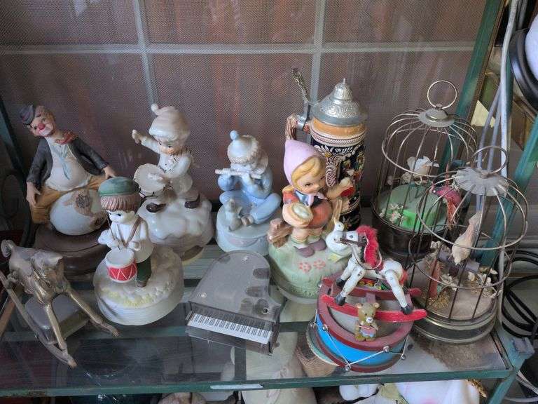 Music boxes: bird in cage, piano, Stein, clown and misc. image