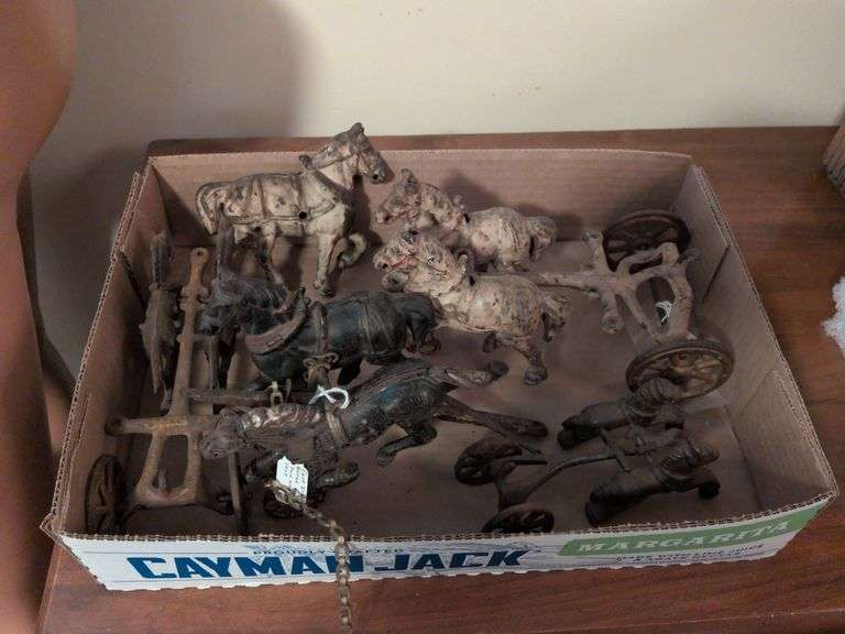 Vintage cast iron horses and carriages image