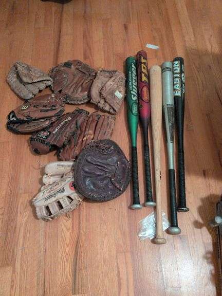 4 aluminum bats, 1 wooden bat and 8 baseball gloves image
