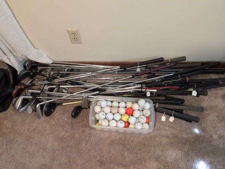 Golf clubs and balls image