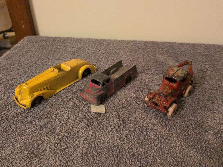 1930s Austin wrecker tow truck(cast iron), Tootsie boat tailed roadster and Tootsie 1949 Ford pickup image