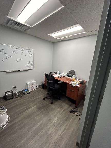 Contents of office, including desk and chairs and assorted office supplies paperwork not included