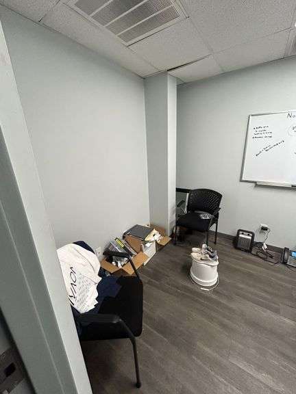 Contents of office, including desk and chairs and assorted office supplies paperwork not included