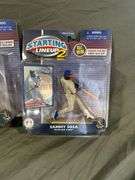 Eight Assorted Starting Lineup Baseball and Football Figurines