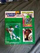 Eight Assorted Starting Lineup Baseball and Football Figurines