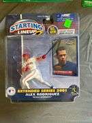 Eight Assorted Starting Lineup Baseball and Football Figurines