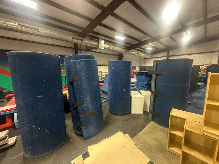 13 Rolls and Assorted Pieces of Padded Flooring image