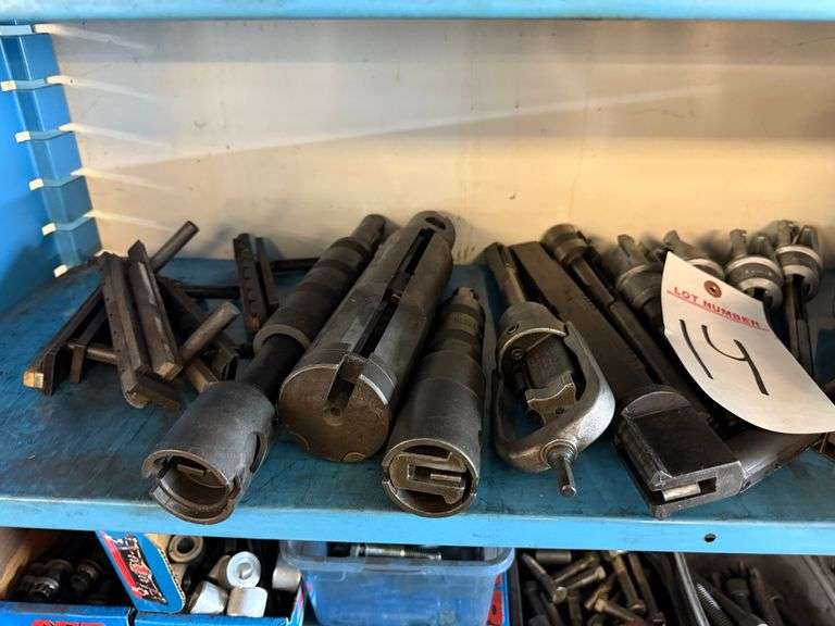 Shelf of Assorted Sunnen Honing Heads and Drivers image