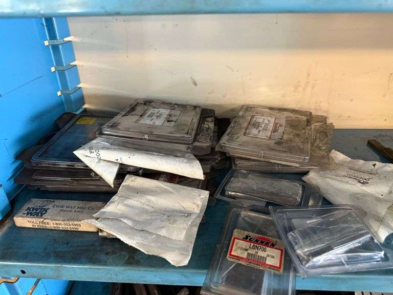 Shelf of Assorted Sunnen Stone Sets image