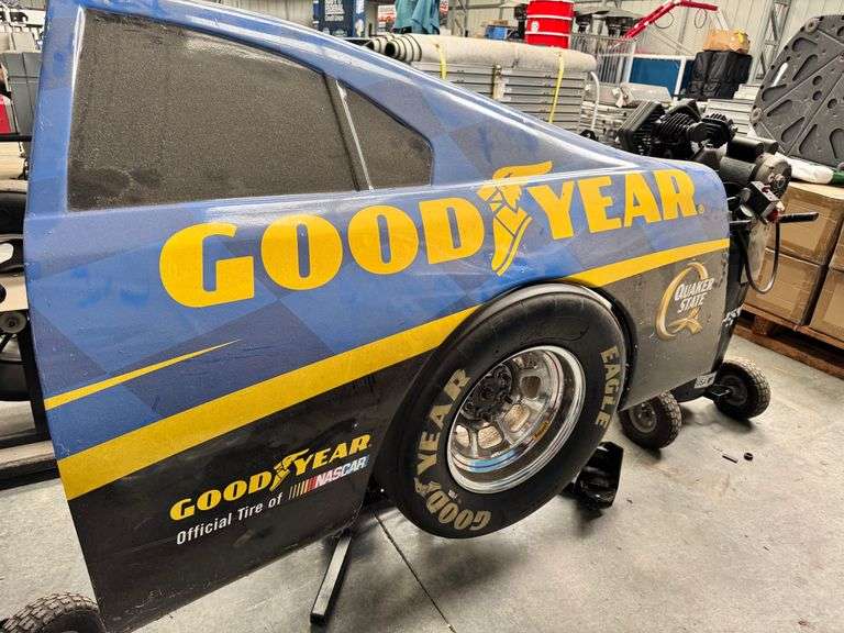 Good Year Branded Quarter Panel Tire Change Game with Husky Air Compressor image