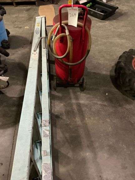 Werner Ladder and 20 Gal Oil Drain Tank image