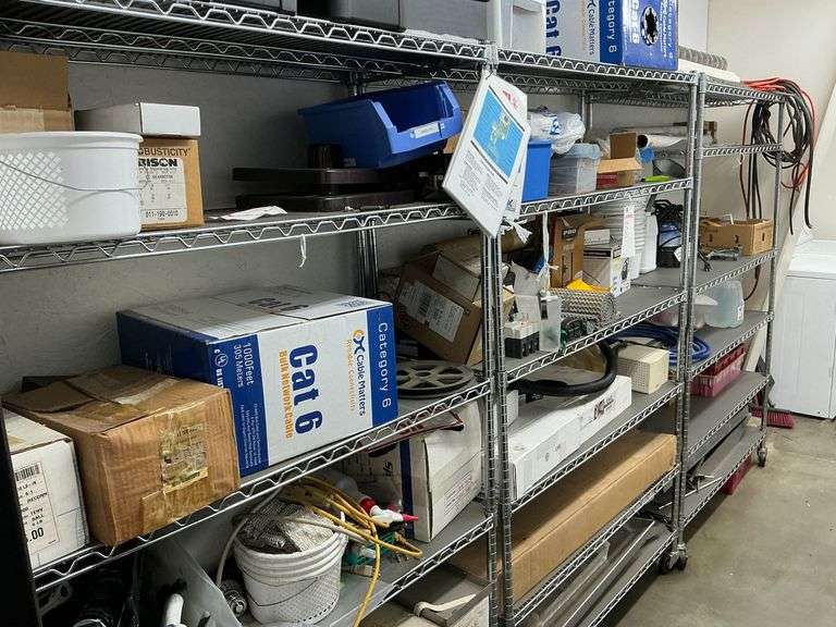 Three Racks with Miscelaneous Supplies image