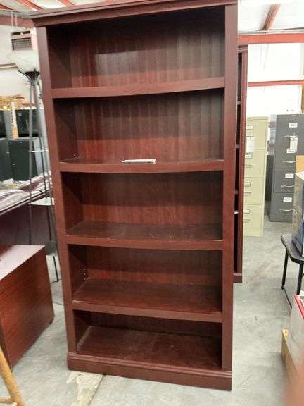 Three Wood Cabinets image