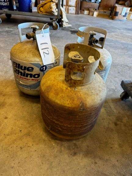 Grouping of Three Assorted Propane Tanks Including One Blue Rhino image