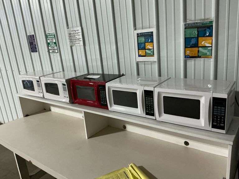 Five Microwaves and Table image