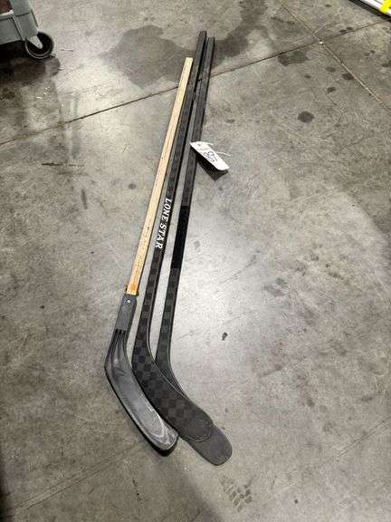Three Hockey Sticks image