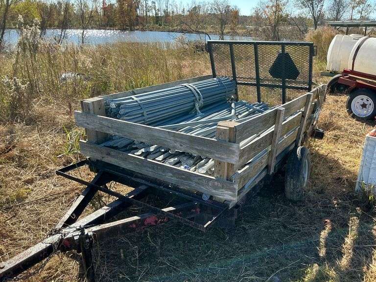 Small Trailer with Metal Pipes image