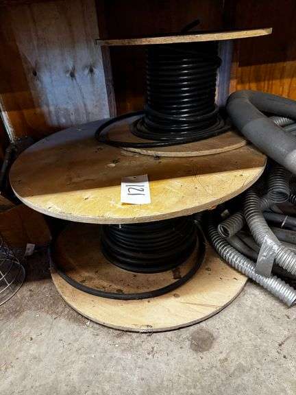 Two Partial Spools of Black Cable image