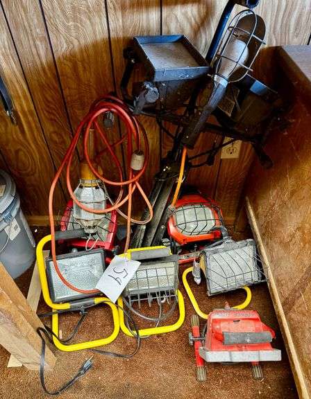 Grouping of Assorted Work Lights, including Halogen Flood Lights, Portable Job Site Lights, and Handheld Trouble Lights. image