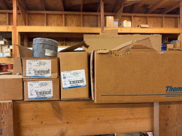 Shelf of Assorted EMT Couplers image