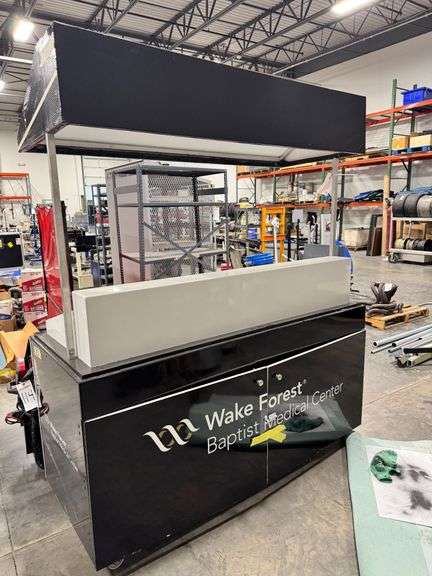 Wake Forest Baptist Medical Center Display with Canopy and Casters, Storage in rear image