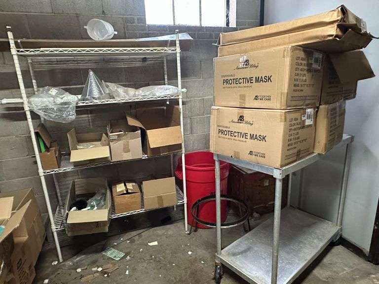 Contents of New Stock Room includes New Steel Toe Rubber Boots, New Gloves, New Food Trays, New Floor Mats, New Protective Face Sheilds, New Carts, and all Shelving