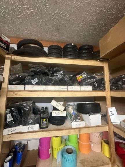 Lot of Racks of Mower Replacement Parts